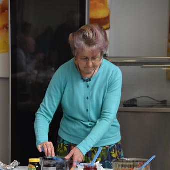 Liz, helping to prepare and serve breakfast